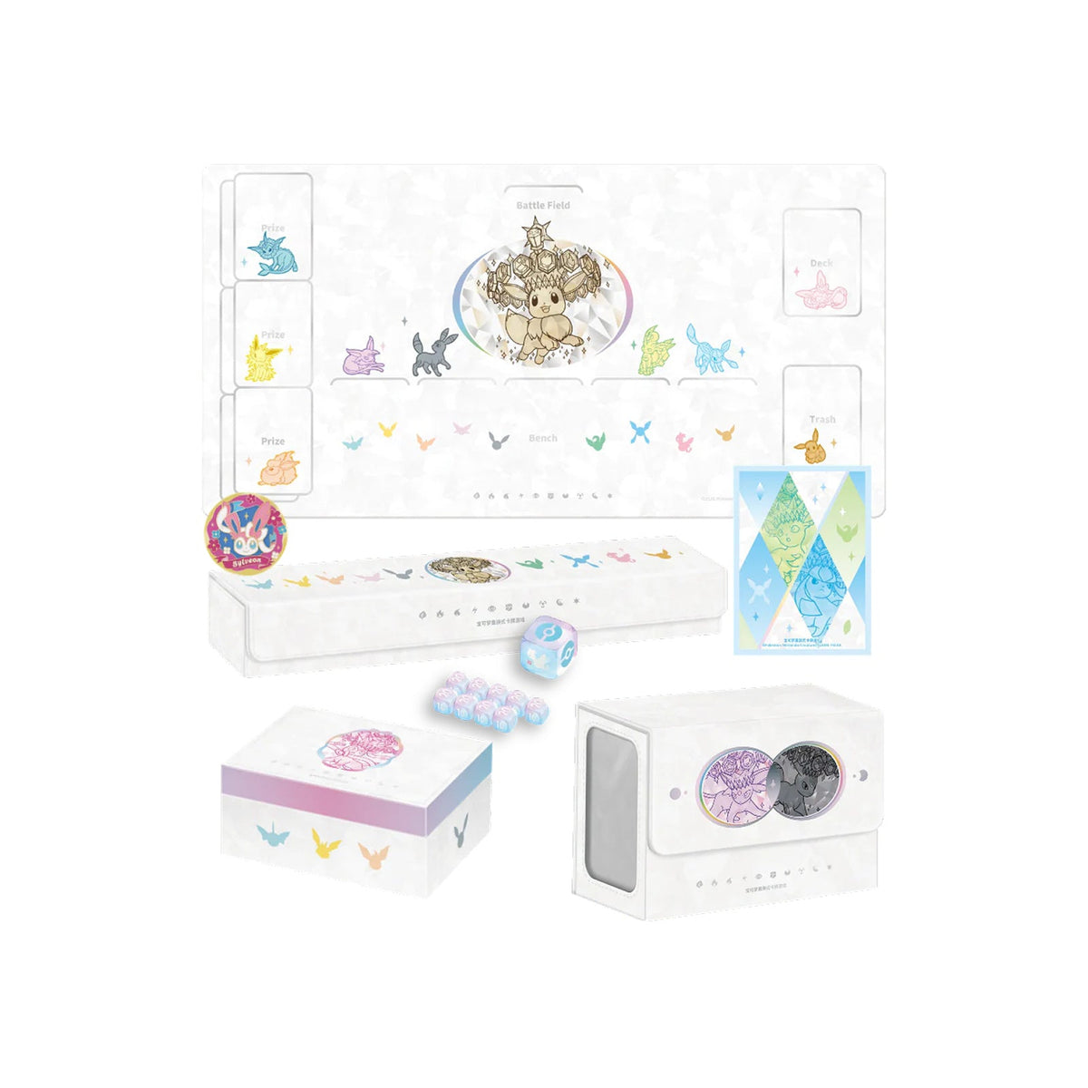 Pokémon TCG Terastal Gathering Eevee Premium Gift Box contents showing the playmat, storage boxes, card sleeves, dice and accessories.