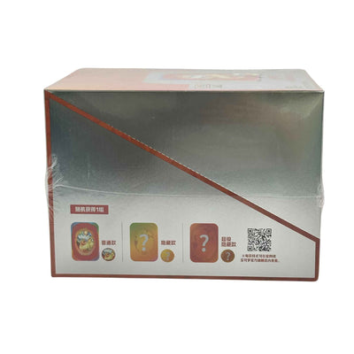  Side of the Pokémon Flareon gift display box showing standard and mystery accessory designs beside a QR code.