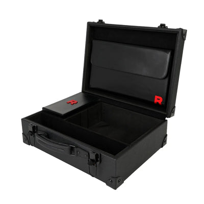 Interior view of the open Pokémon TCG Chasing Glory Together / Destined Rivals Team Rocket collector briefcase on a white background.