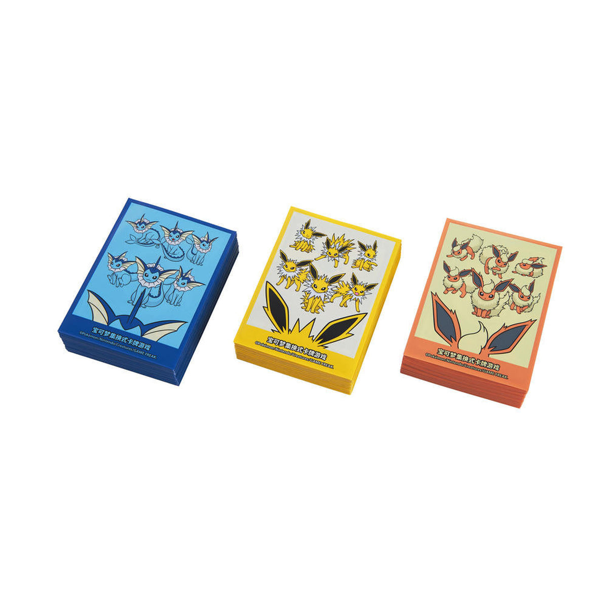 Vaporeon, Jolteon, and Flareon card sleeves from the Pokémon TCG Eevee Advanced Gift Box
