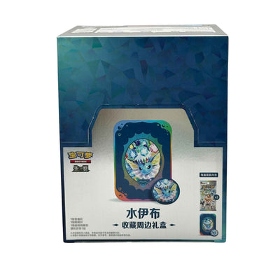 Front of a blue Pokémon Glaceon collectible gift display box showing Glaceon tin artwork and booster-pack illustrations.